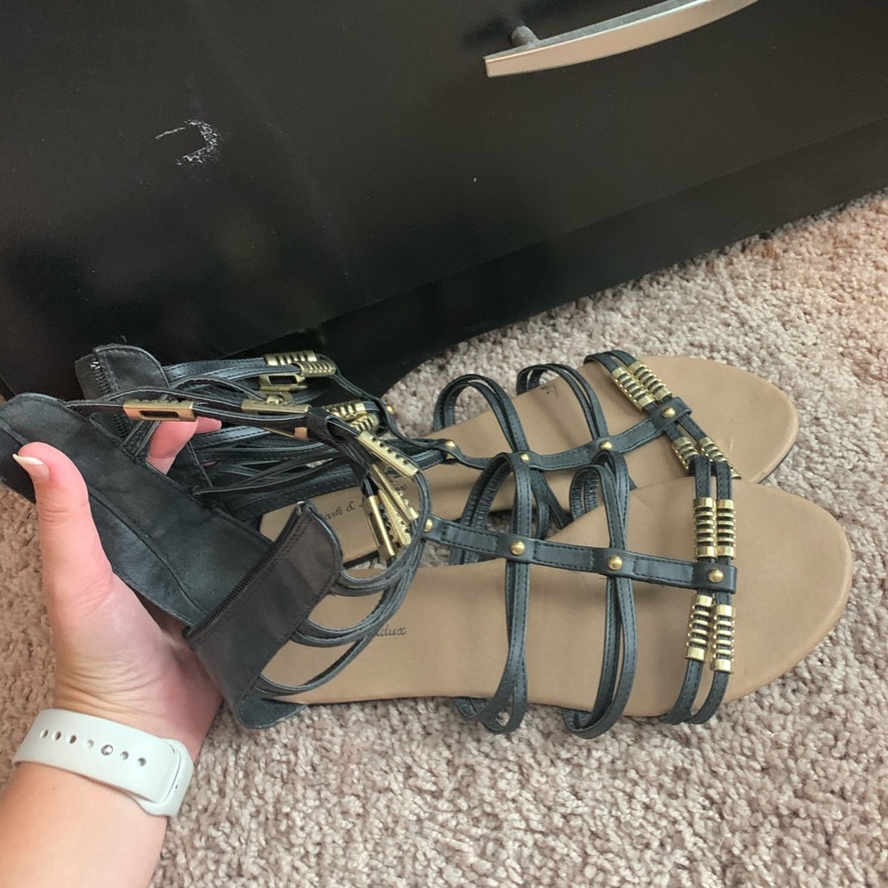 black and gold gladiator sandals